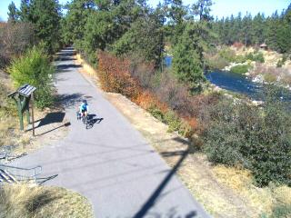 Cycling the paved Centennial Trail beside the Spokane River