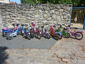 Parking lot in front of a kindergarten along the river Main