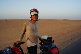 Me in Sudan crossing the sahara and a little dirty.
