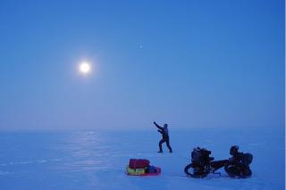 night ride on frozen Arctic Ocean